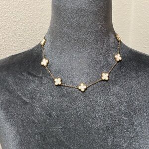 Elegant Gold and White Clover Necklace